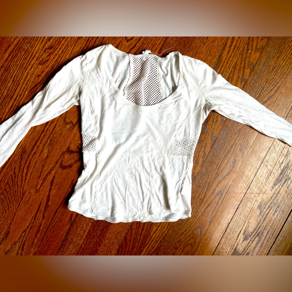 free people long sleeve with mesh cut outs in back size small